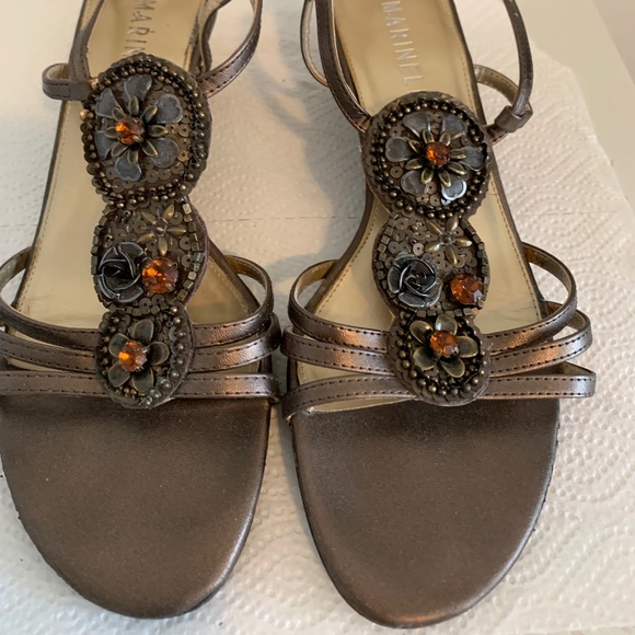 Brown Flat Sandals with Multiple Straps and Circular Ornaments - Picture 1 of 8